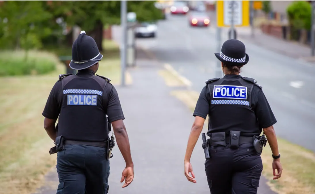 Two Police Officers walking