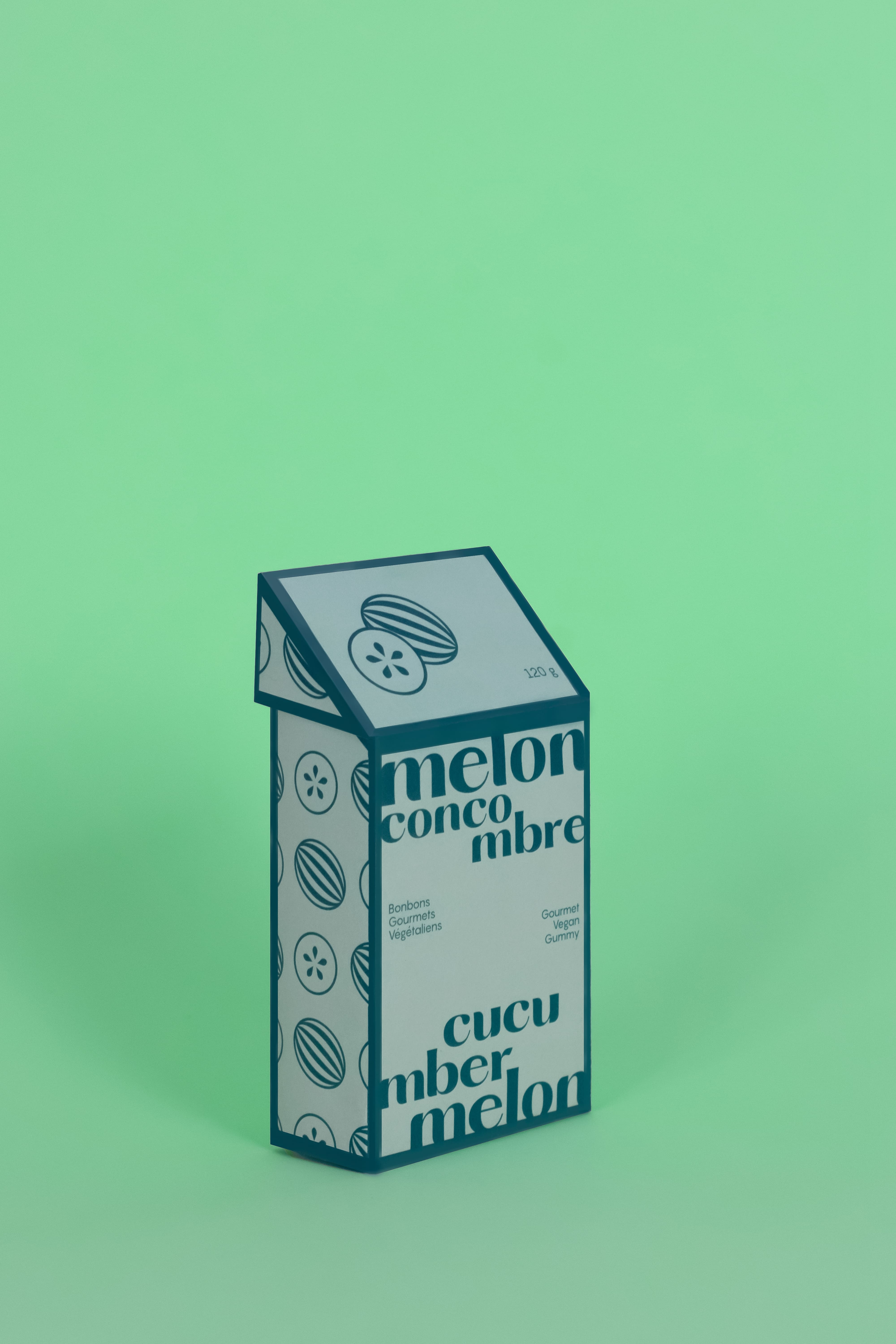 A green candy package on a light green background.