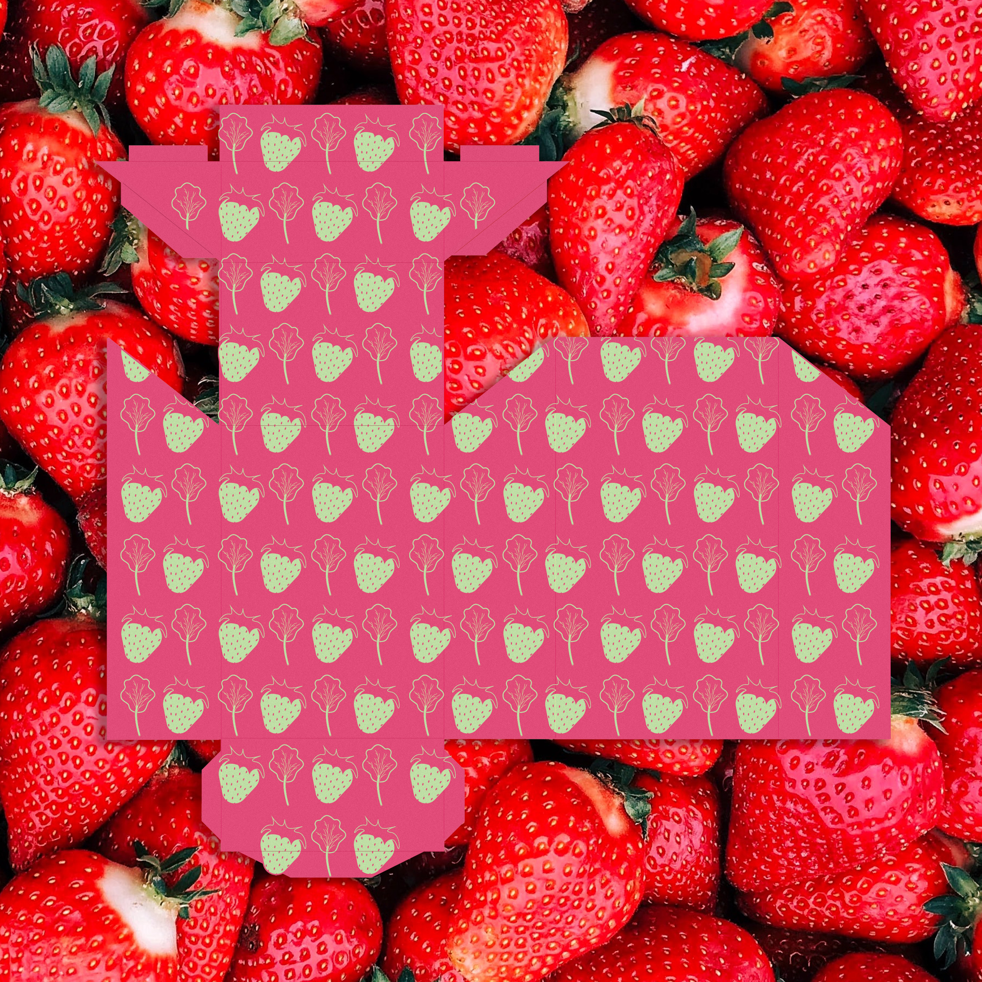 A green and pink candy package on a picture of strawberries.