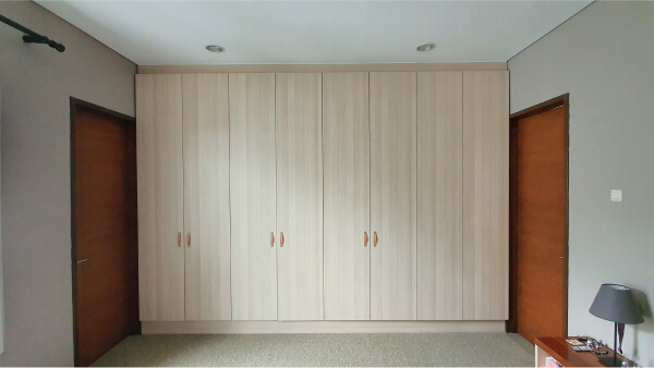 Tall bedroom cabinets, successfully installed in a client's bedroom.