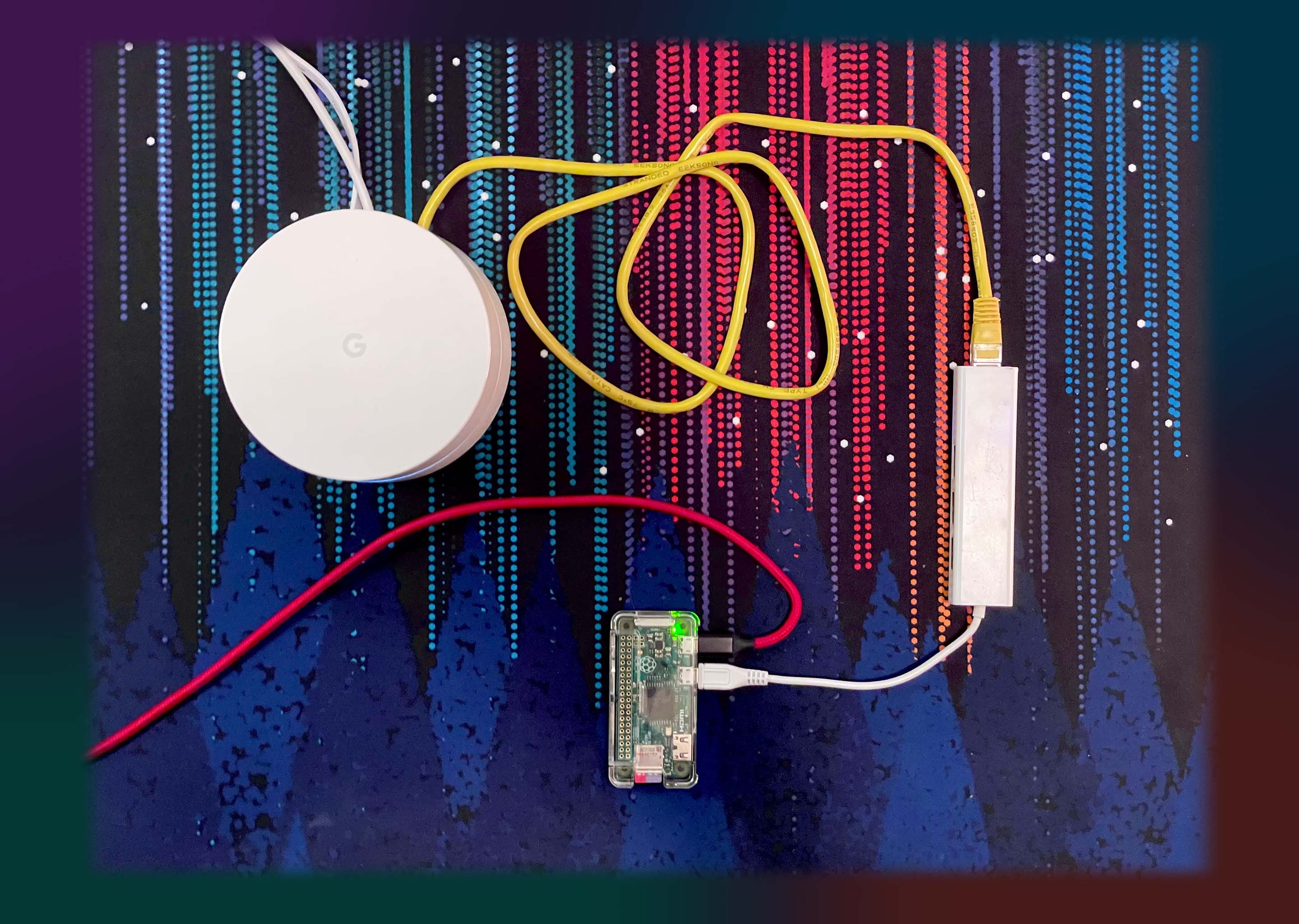A Google Home Router connected via Eithernet to the Raspberry Pi Zero.
