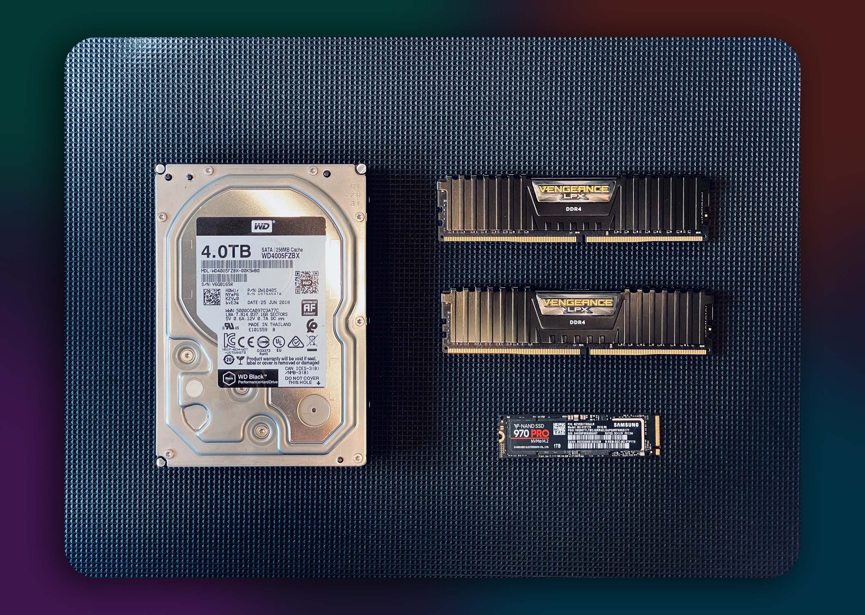 A 4 TB WD Black HDD, 32 GB of Vengeance LPX RAM, 1TB 970 PRO M.2 Drive.