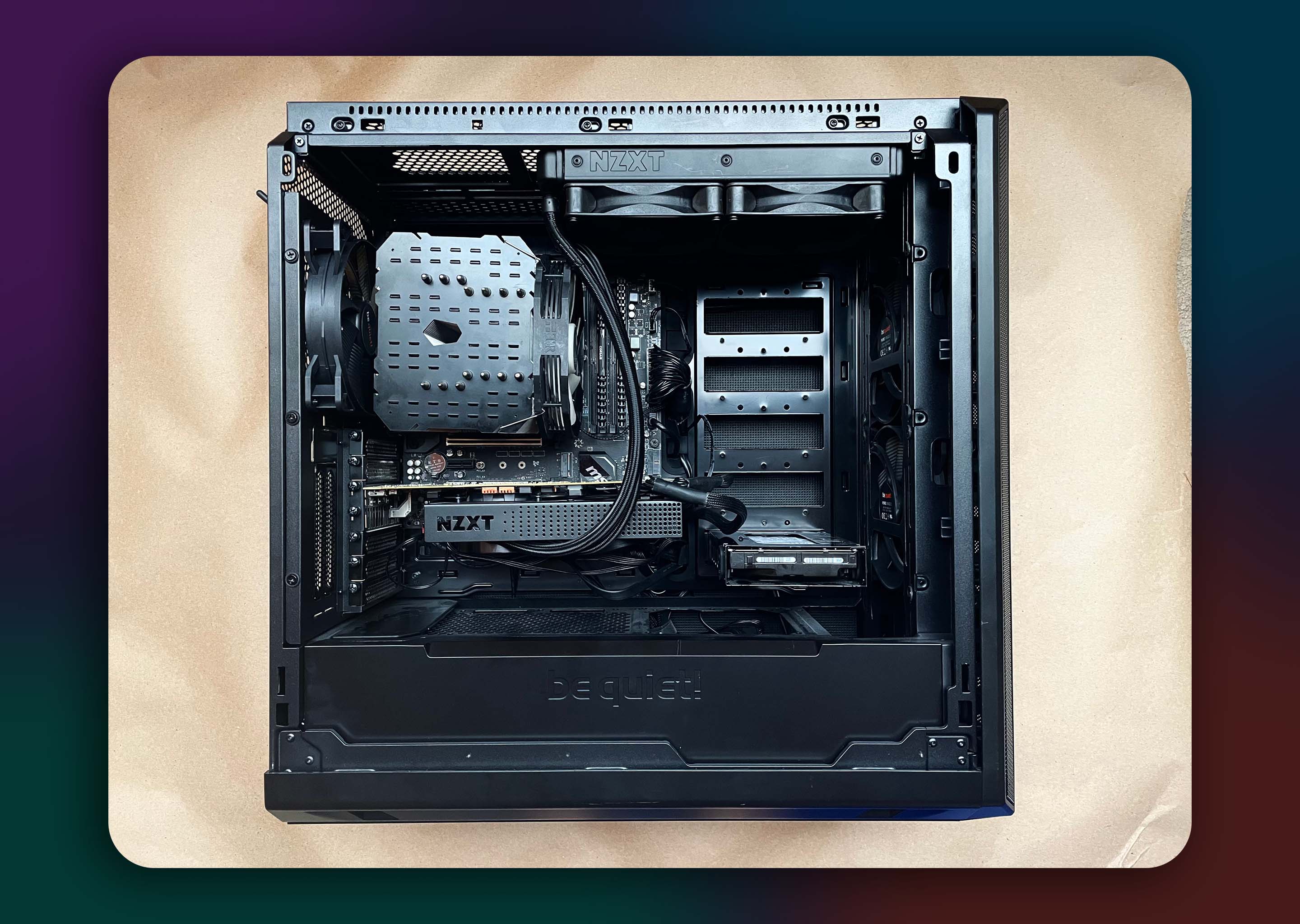 A computer with an open side panel. The GPU and CPU have been installed.