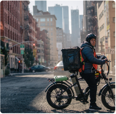 Male supplier with a bike