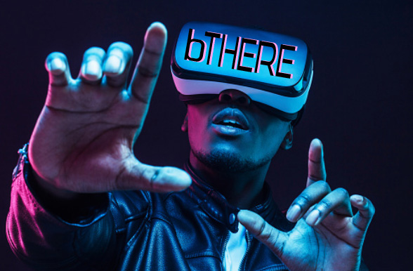 b There branded vr headset on person being entertained