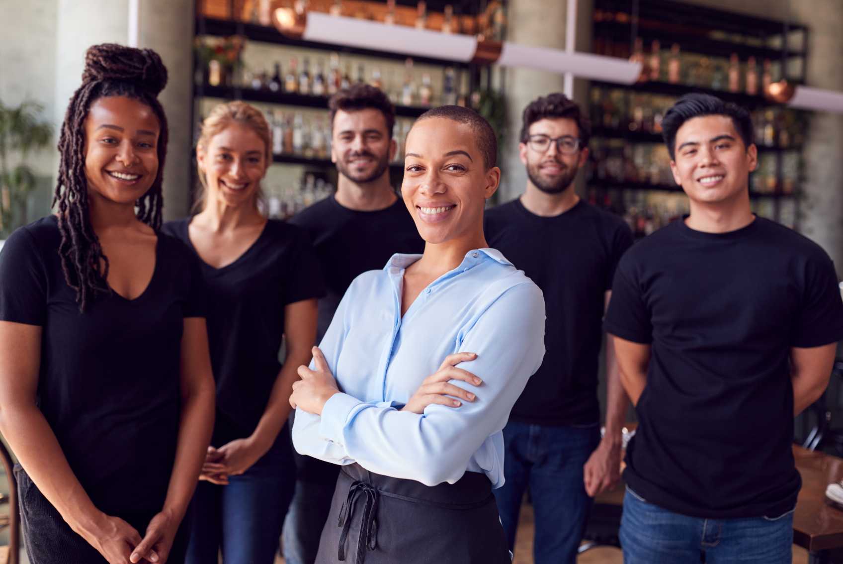 team of women and men in a restarant