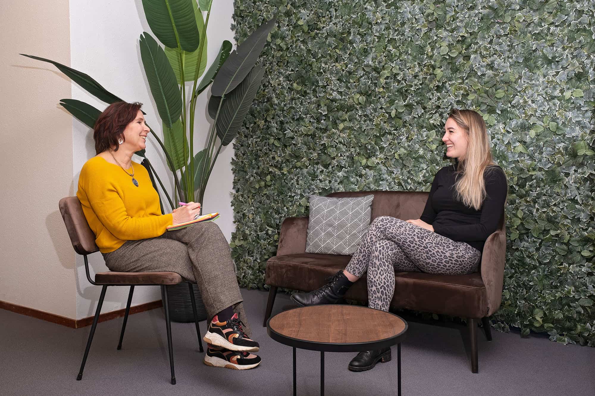 Coach and client talking