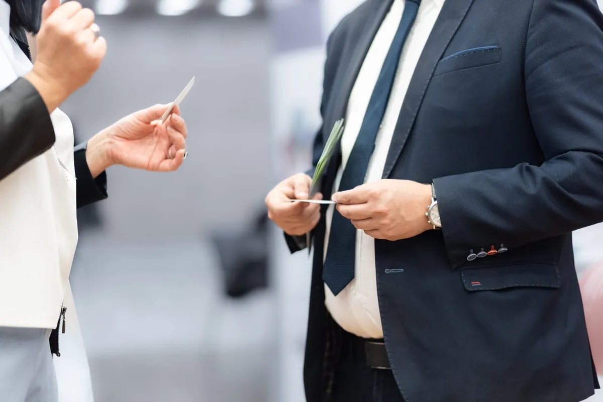 business people exchanging business card