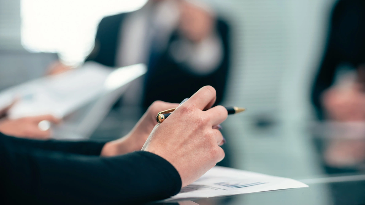 close up businessman studying financial documents