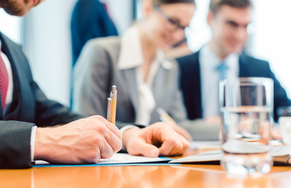 businesspeople analyzing documents