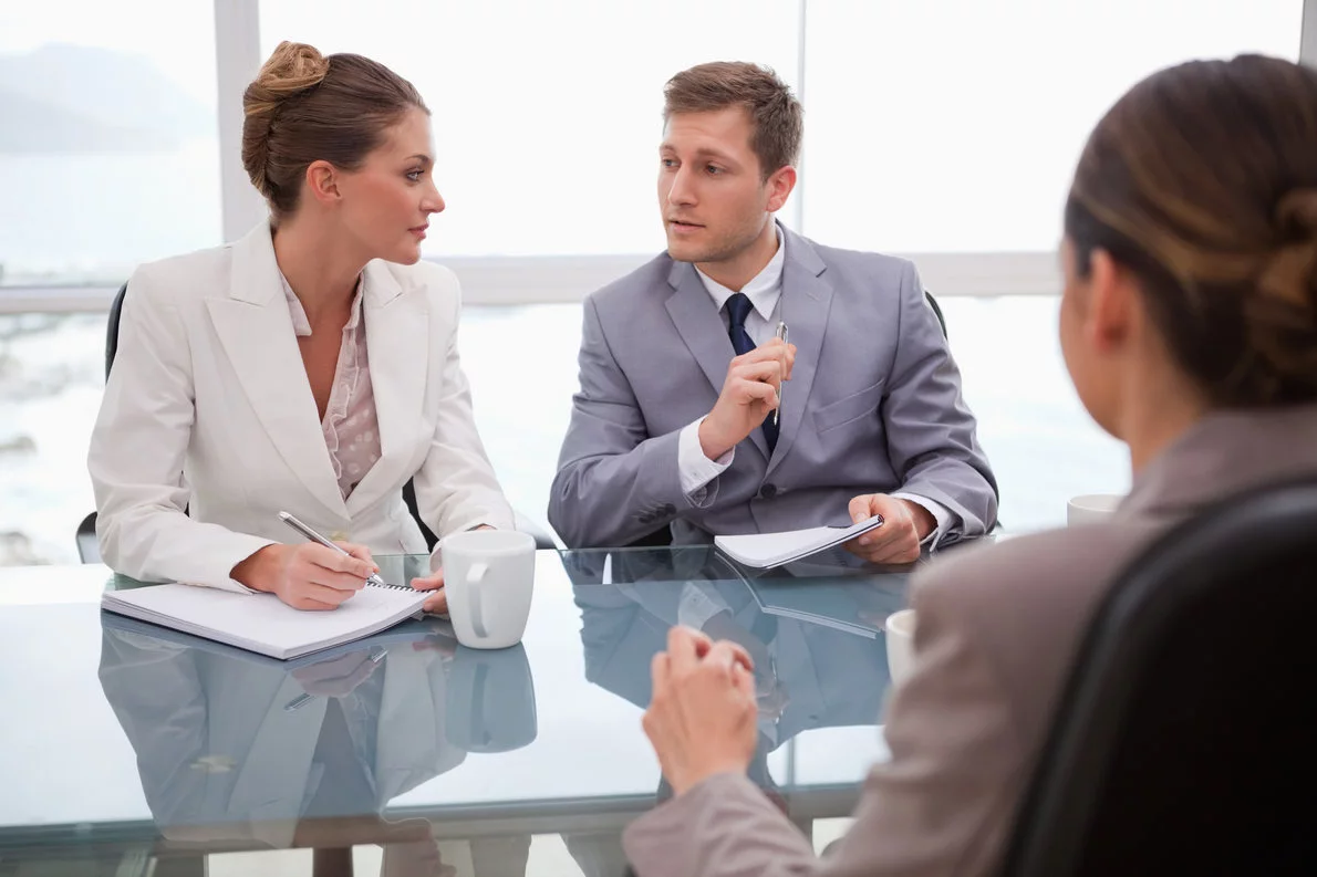 business team deliberating with lawyer