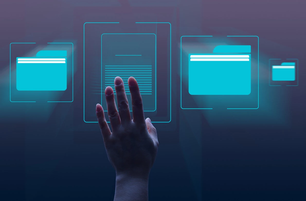 a female hand and virtual icons of folders