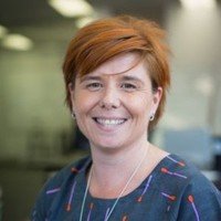 Headshot of Melanie Koster, General Manager at base2Services