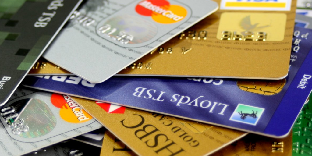 A pile of different credit cards, evoking the idea of paying for ec2 instance pricing via different methods