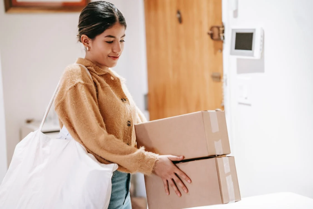 A female shopper with a handful of eCommerce returns