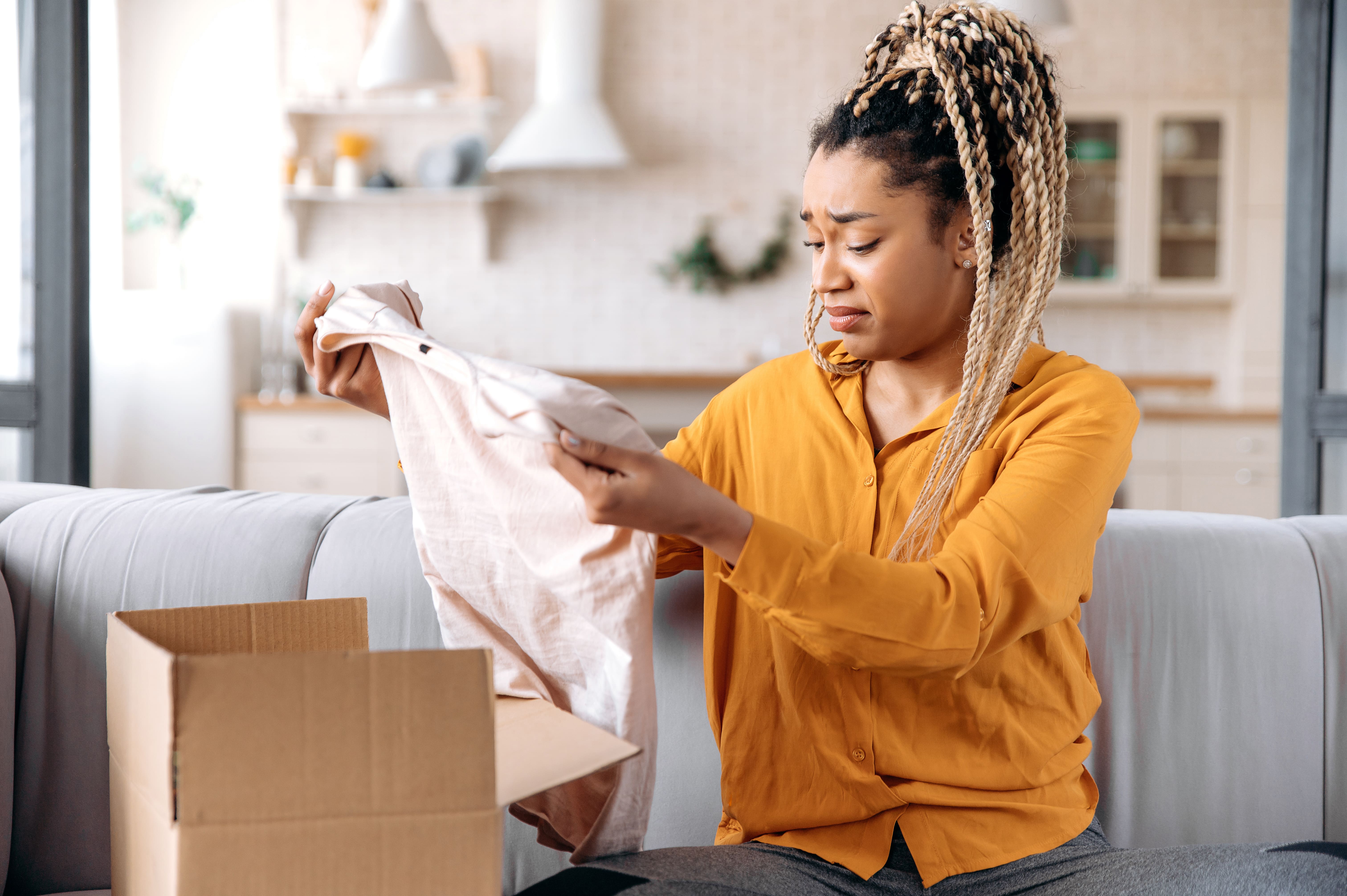 A shopper who purchased the wrong size clothing, contributing to rising return rates