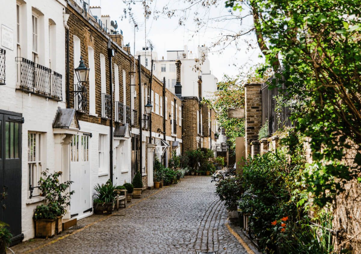 a narrow street with buildings on both sides