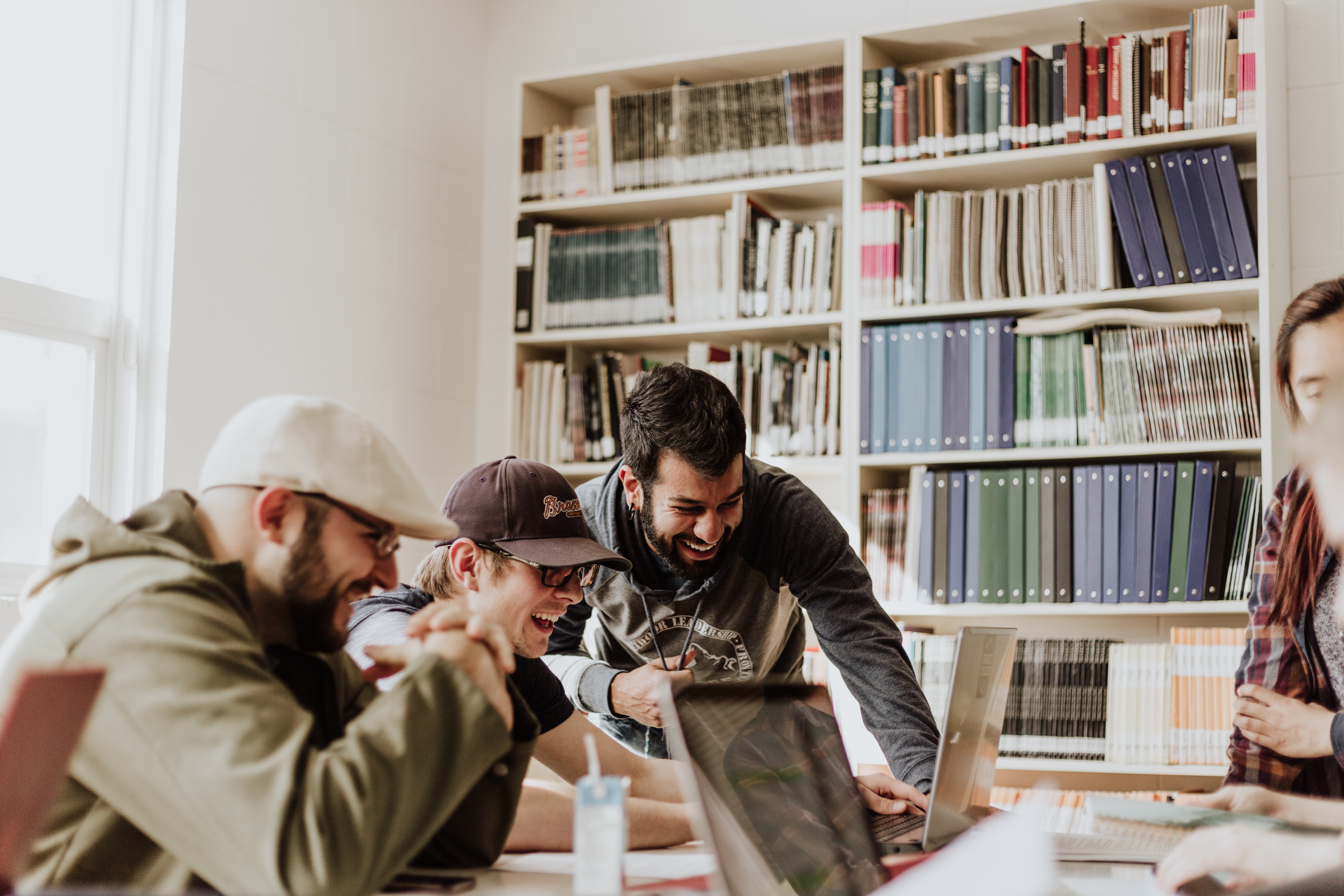 group of coworkers learning together in a library
