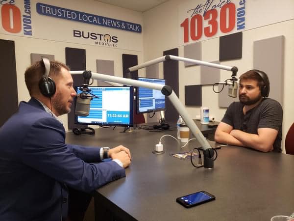 Zach interviewing a guest on his radio show