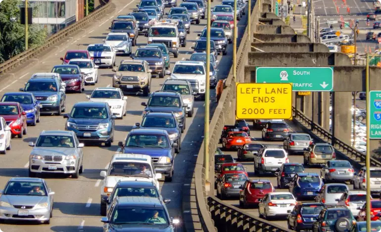 Traffic backed up on vertically stacked three-lane highways in Seattle, Washington.