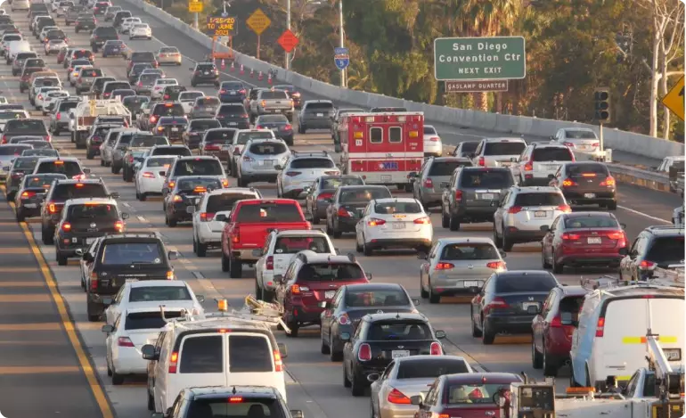 A back-up highway in San Diego, California. A sign says "San Diego Convention Centre |Next Exit".