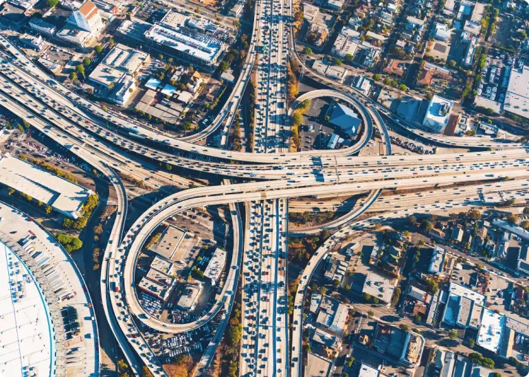 Aerial view of a large cloverleaf intersection in Los Angeles, California.