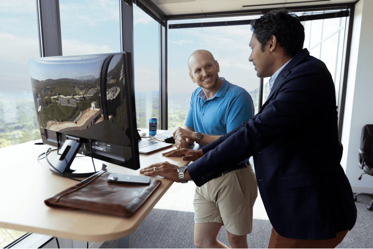 People working at desk in office