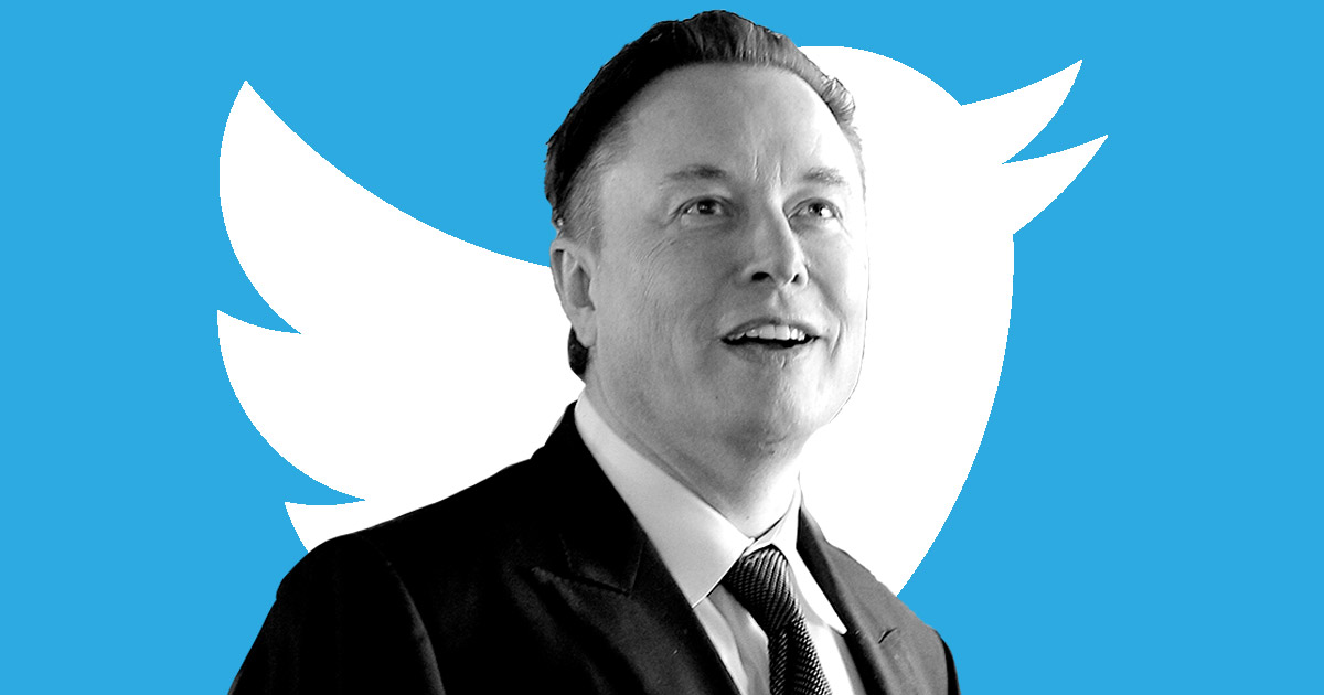 Elon Musk with Twitter logo in the background