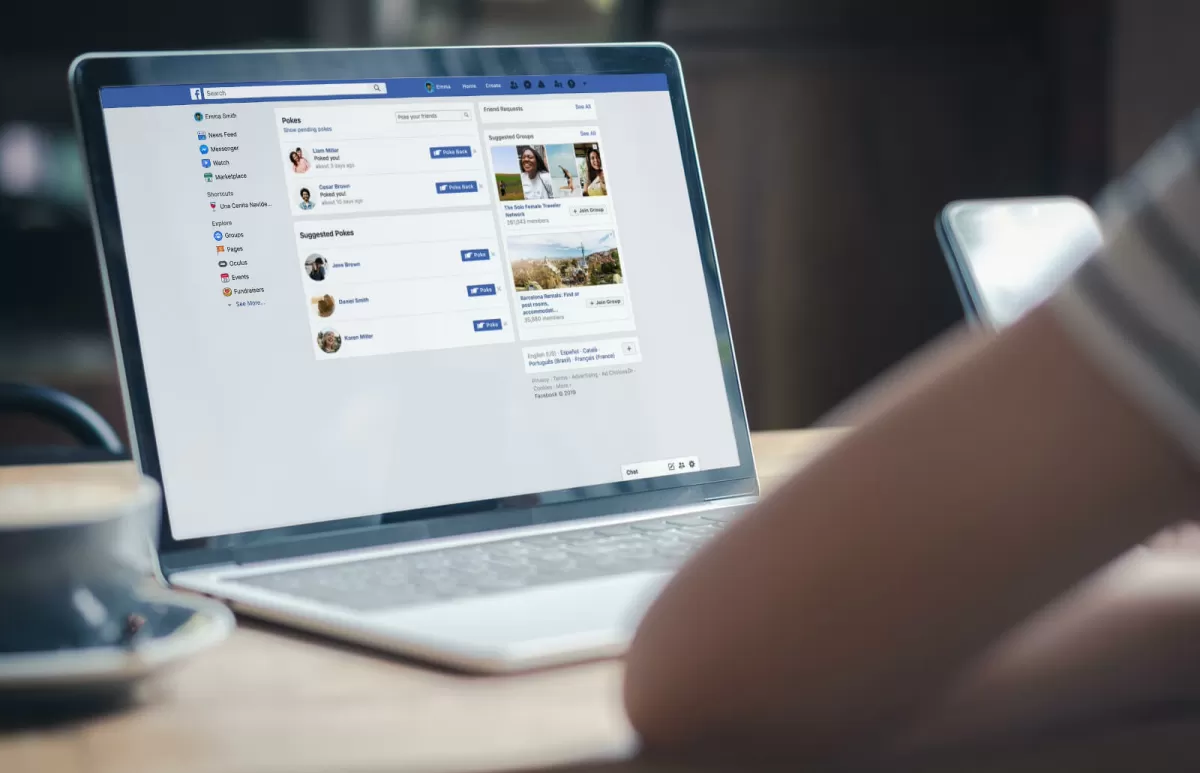 Image of a laptop screen showing facebook UI
