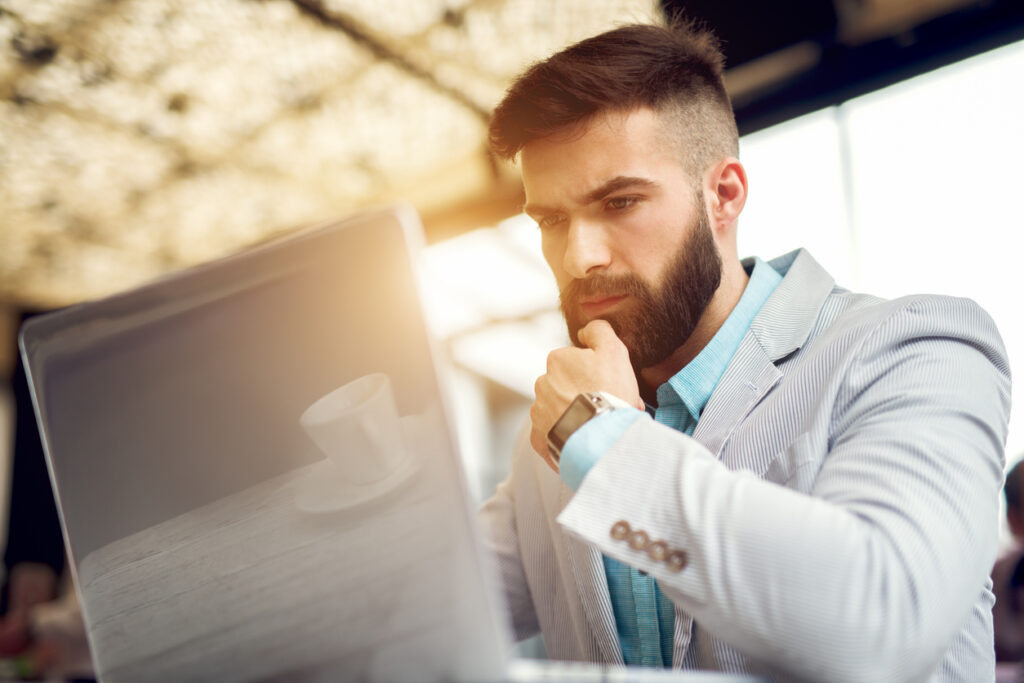 Worker checking conversion rates on Google analytics