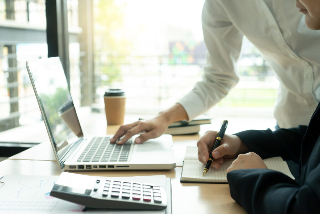 Workers calculating the ecommerce conversion rate