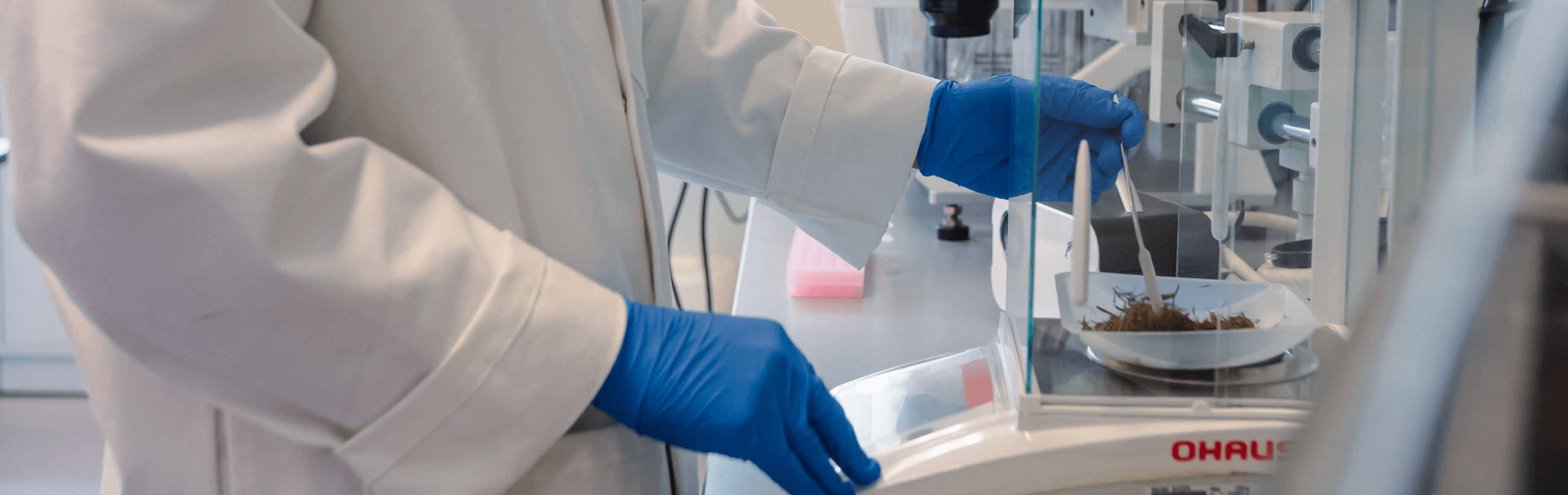 scientist using apparatus in the Filament Health laboratory
