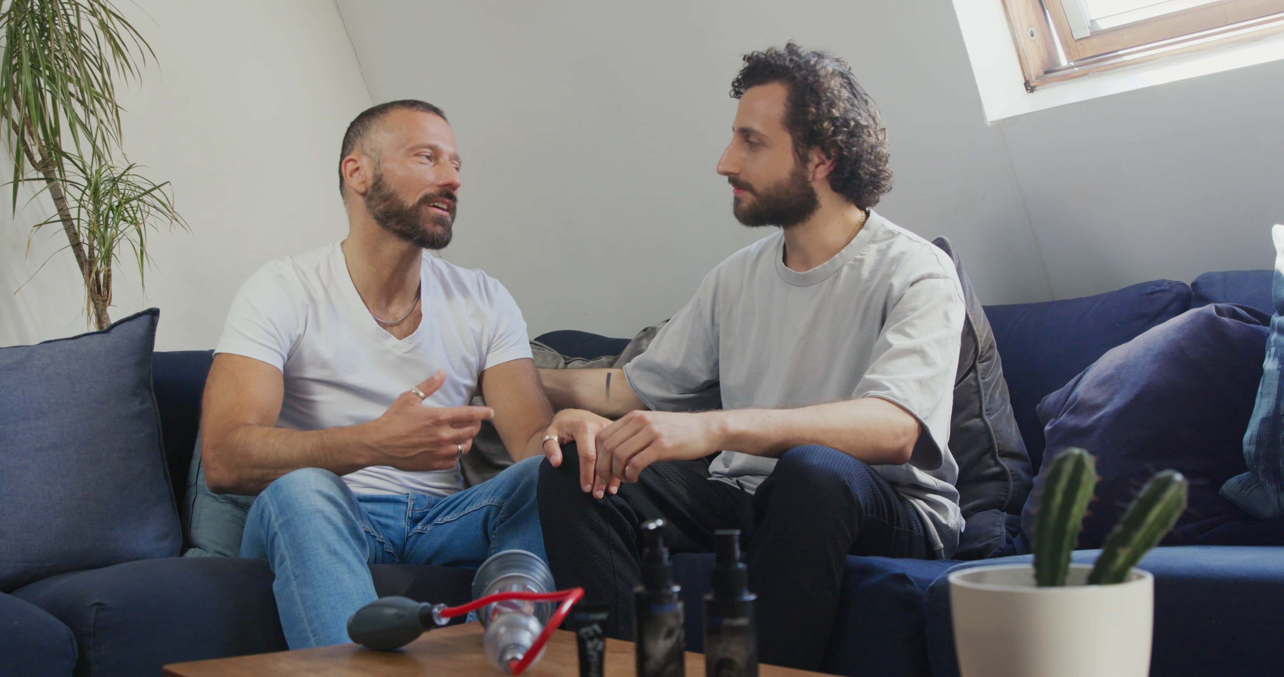 two men chatting
