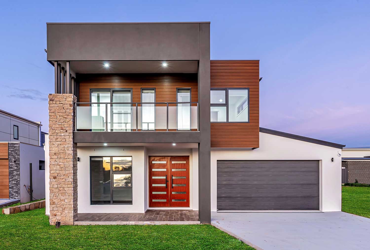A square and modern front facade on a new home.