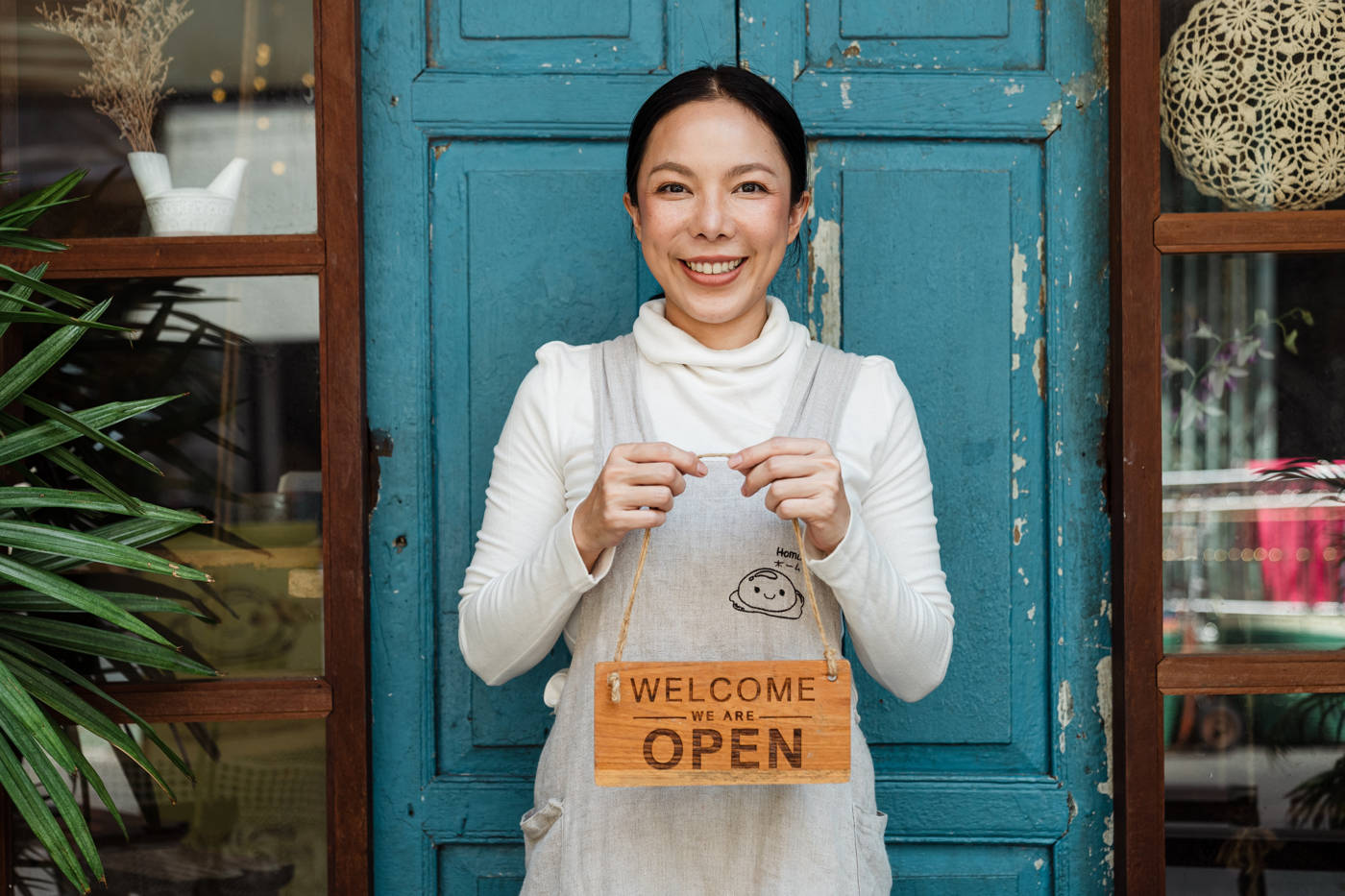 Woman holding sign