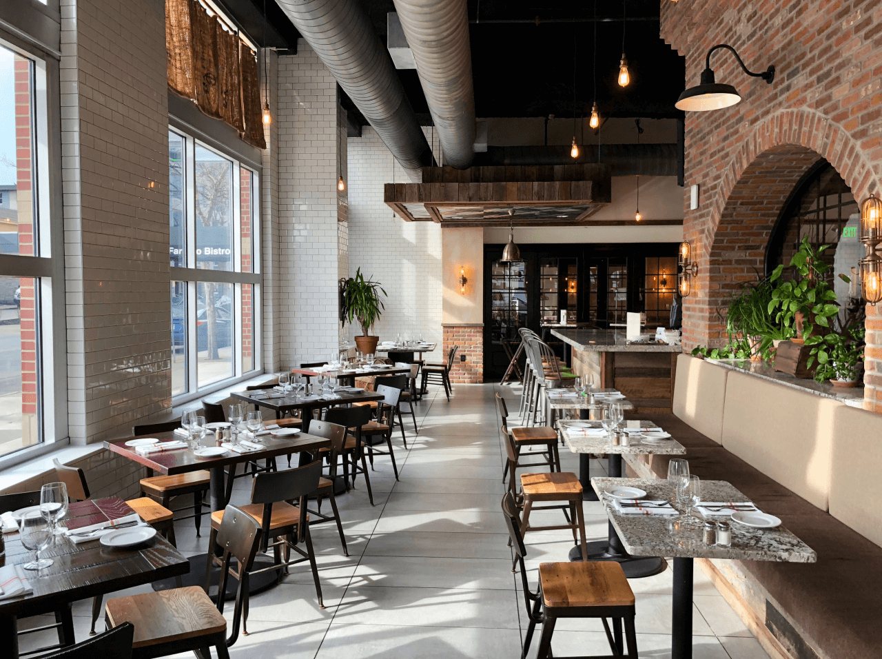 Coltivare restaurant industrial-inspired dining area by Rocco Design + Build