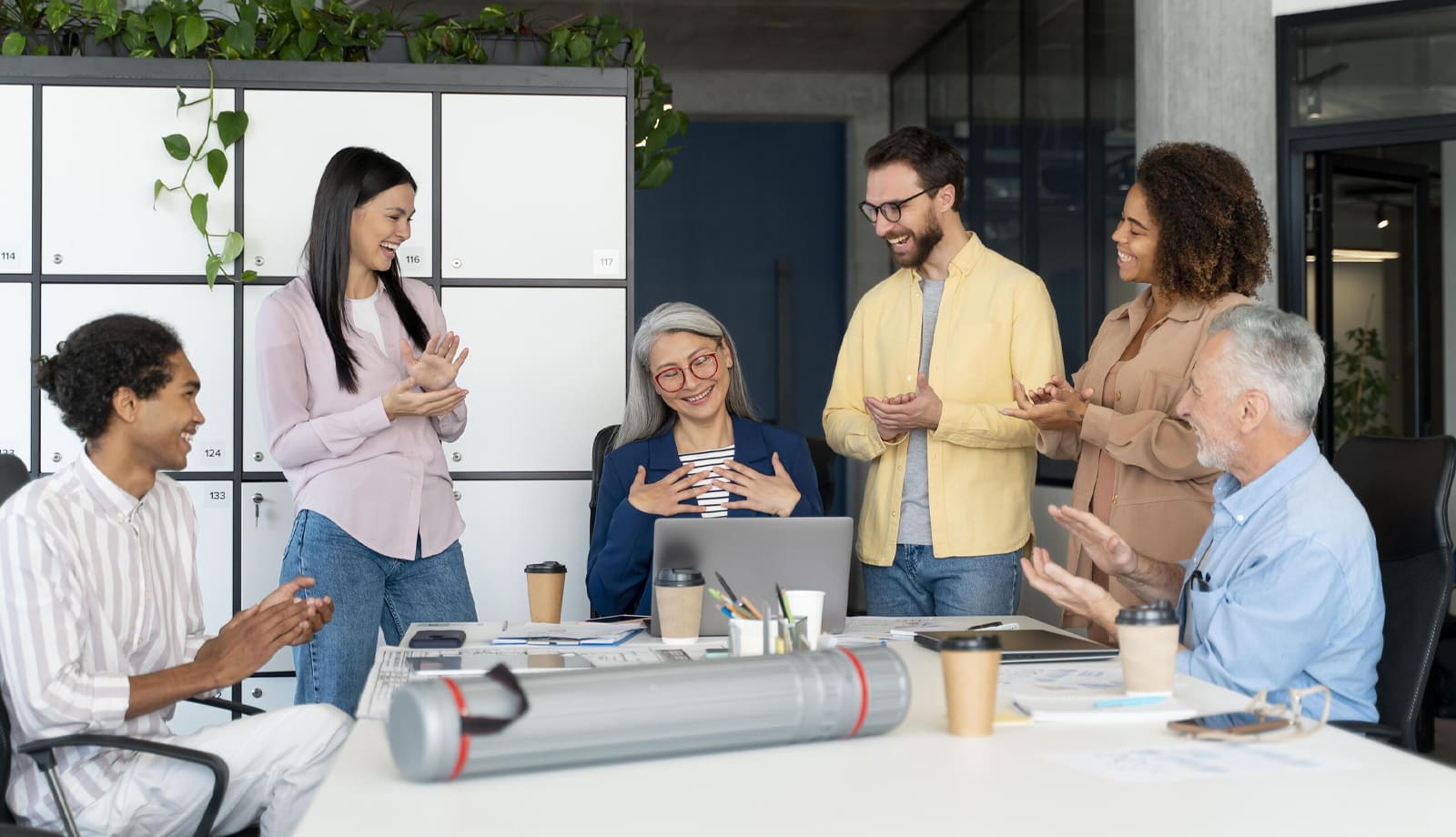 Team of professionals gathered at work.