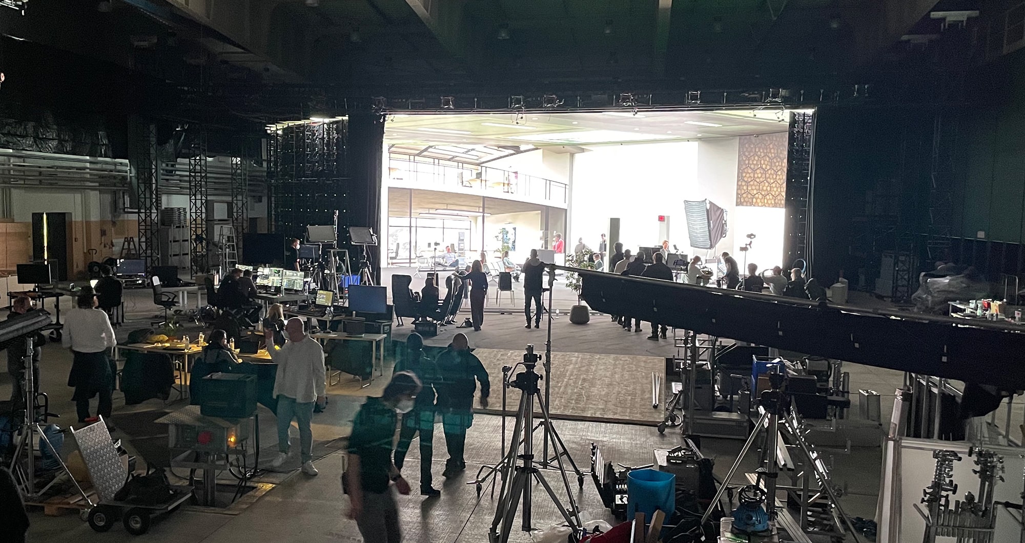 Virtual production set with camera crew and equipment at HYPERBOWL studio in Penzing