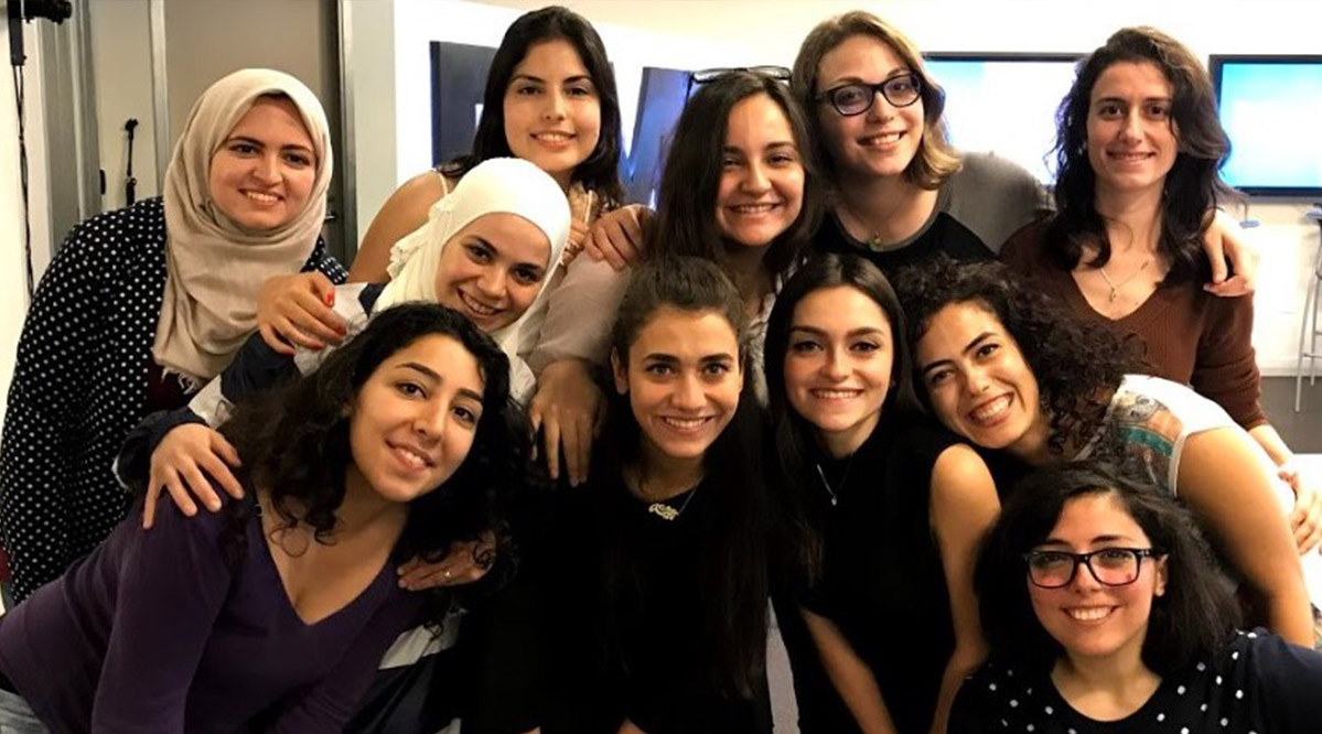 Jusoor 100 Syrian women award winners in a community gathering