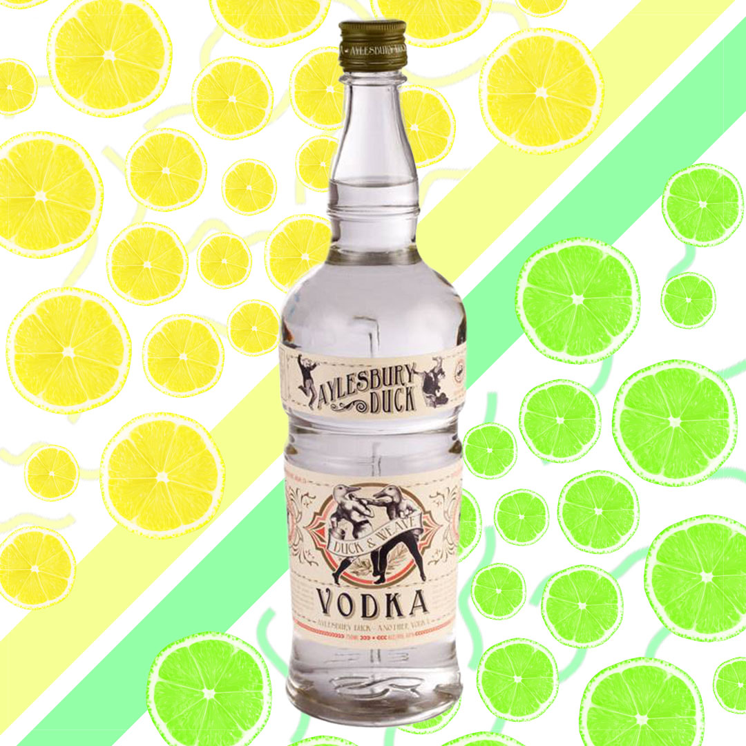 Bottle of vodka with lemon-lime background.