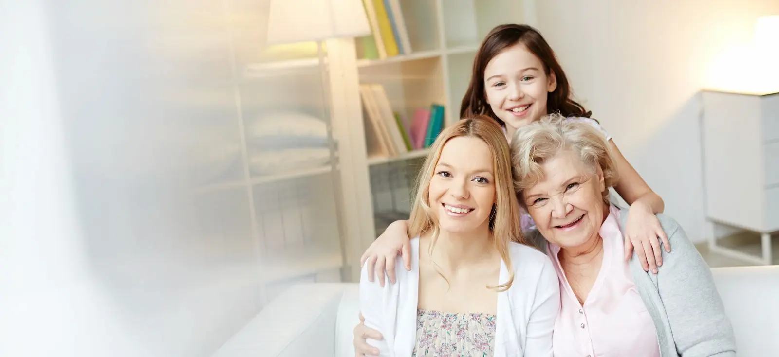 family hugging and smiling