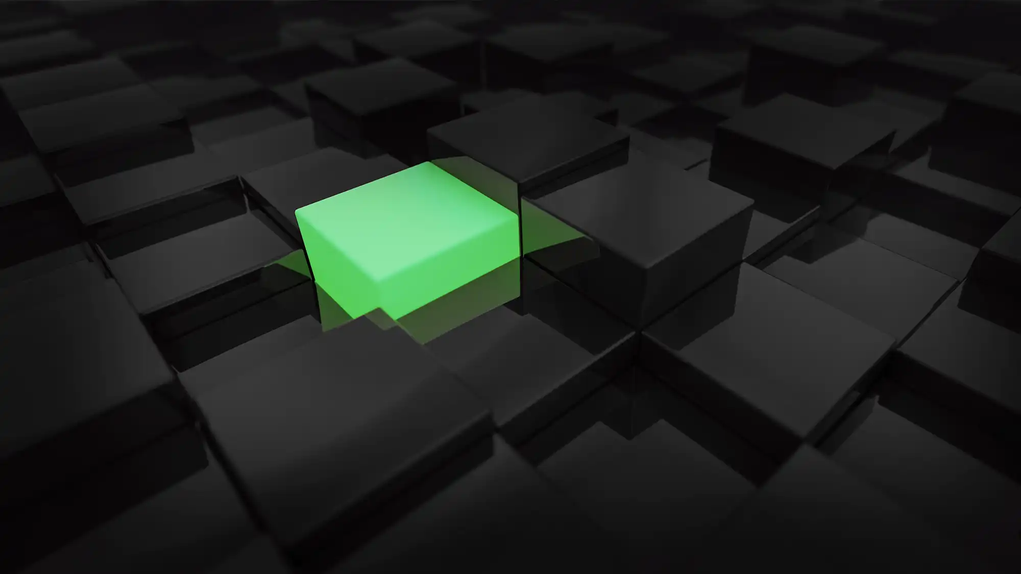 A green three-dimensional box surrounded by many gray-black boxes