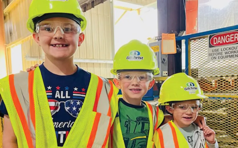 Young kids at a sawmill