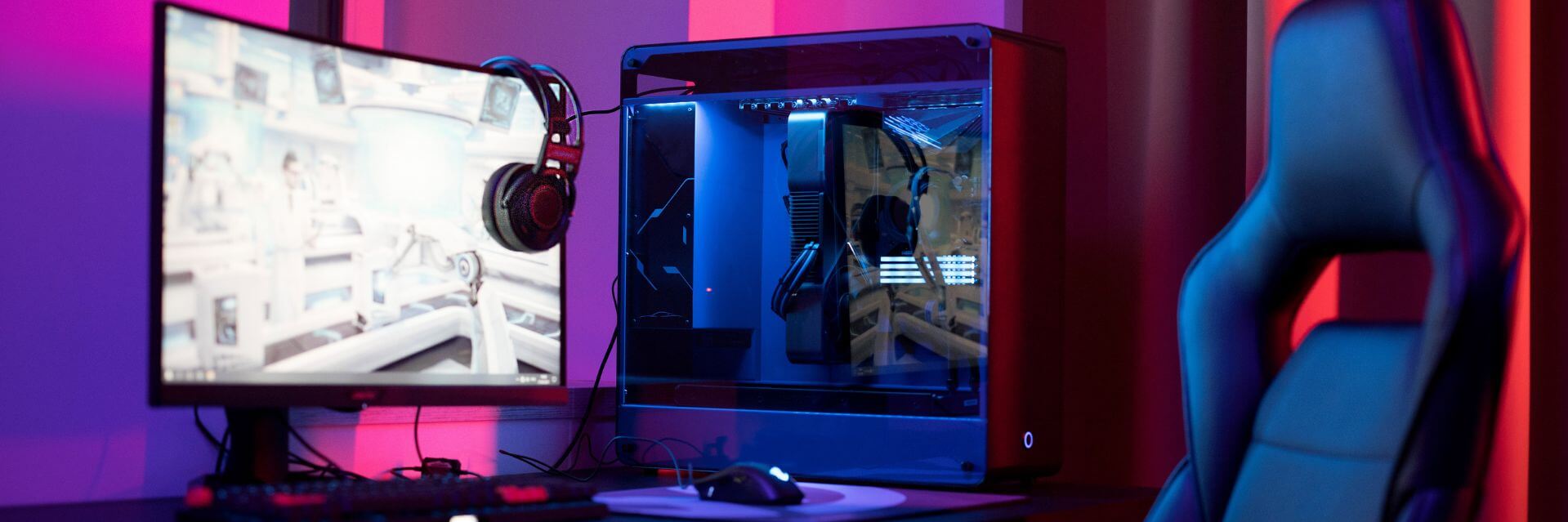Photo of Serenity esports teams member gaming setup with desktop build and gaming chair and monitor