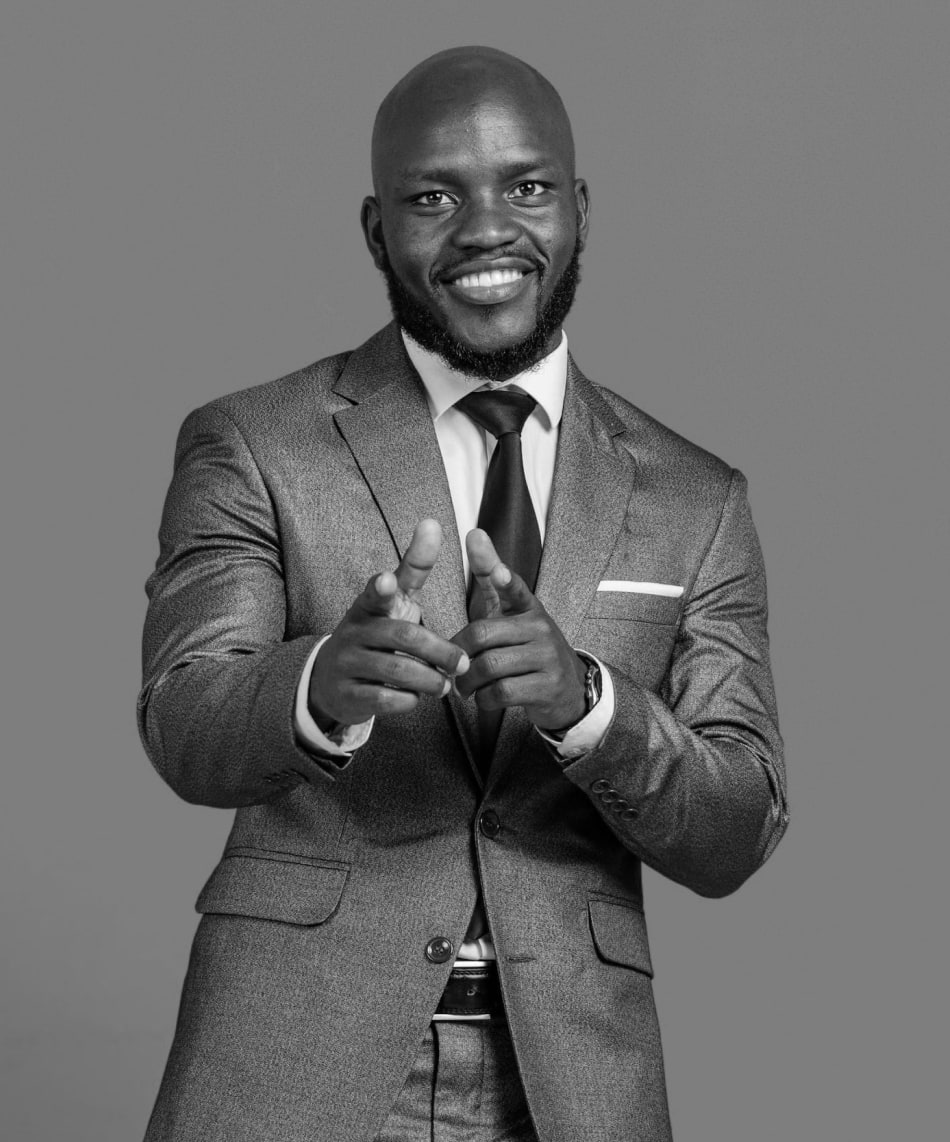 man smiling and pointing