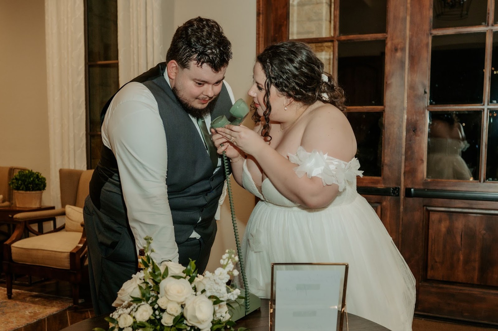 Bride and groom leave each other a voicemail