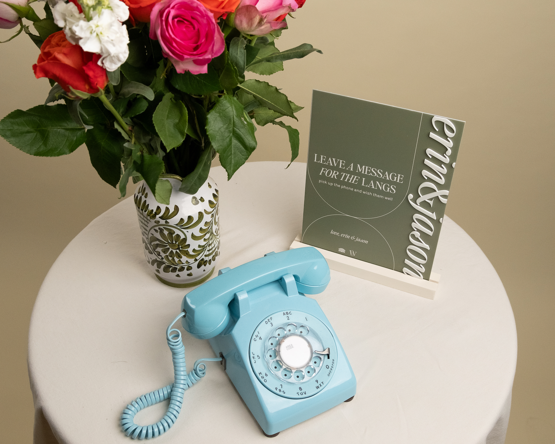 Blue phone guestbook on wedding guest book table
