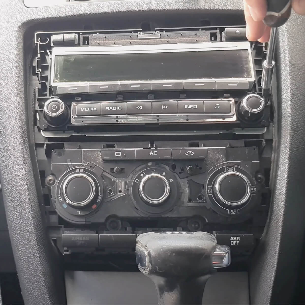 4. Carefully remove the radio and view the sticker. Note, you don