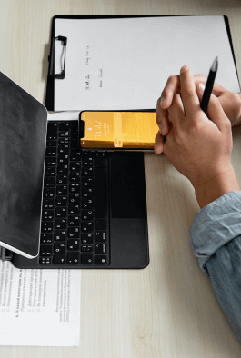 laptop, mobile & hands of a person