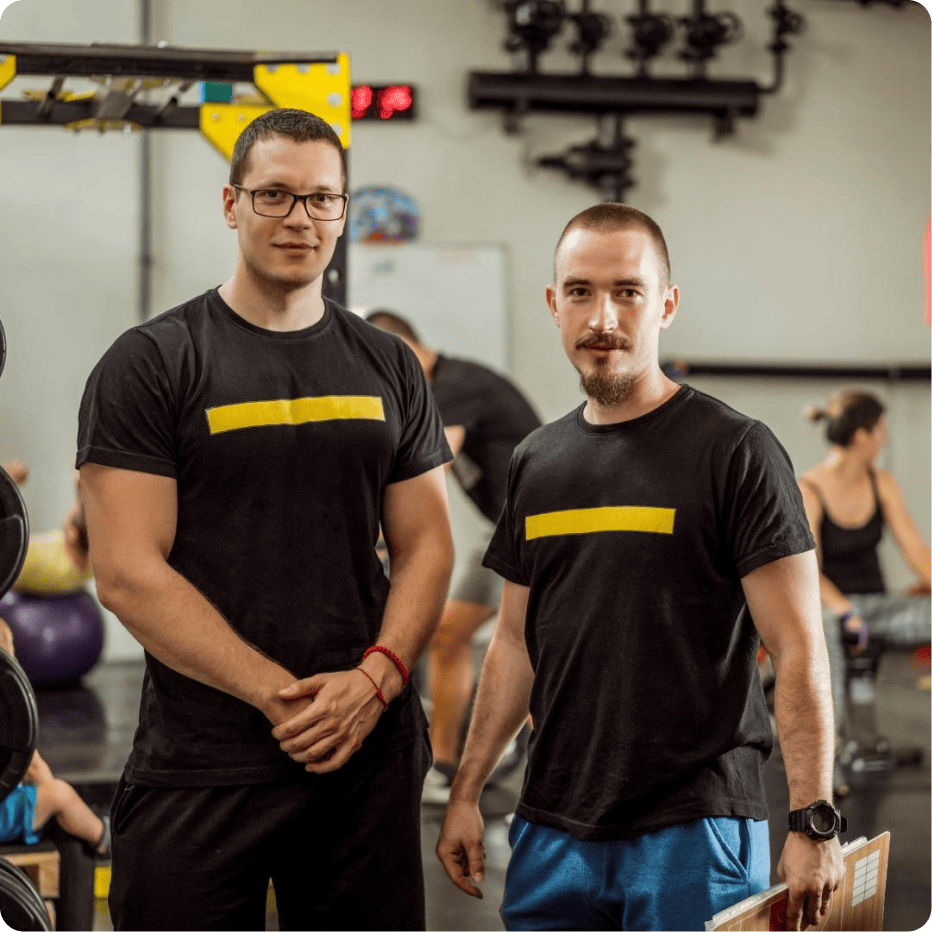 Two trainers who are owners of this gym